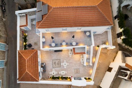 an overhead view of a house with an orange roof at Lumiére spetses in Spetses