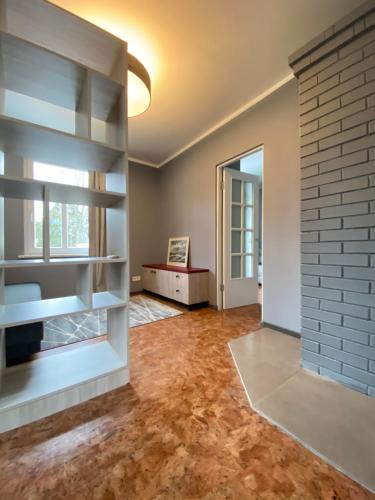 En eller flere senge i et værelse på Jurmala holiday house