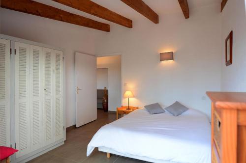 Ένα ή περισσότερα κρεβάτια σε δωμάτιο στο Residence les Bell'ombres