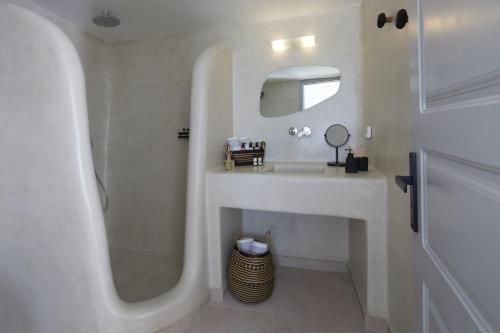 Un baño de El Verano Suites