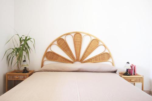 A bed or beds in a room at Casa Simone by RENTHOUSESALENTO