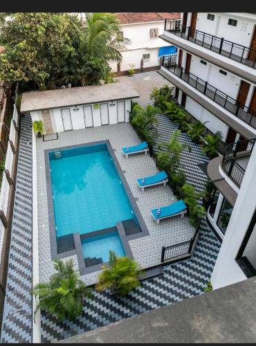 an overhead view of a swimming pool on a building at Aloha Holiday Resort in Baga