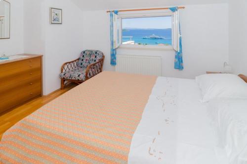 Posteľ alebo postele v izbe v ubytovaní Apartment in Orebic with sea view, terrace, air conditioning, WiFi 114-2