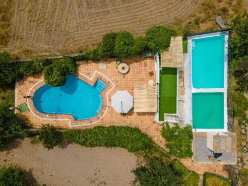 an overhead view of a swimming pool in a yard at Villa Fuente Victoria in Fuente Victoria