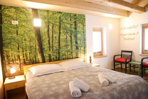 Säng eller sängar i ett rum på Apartments Storzek