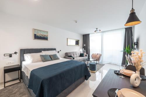 Posteľ alebo postele v izbe v ubytovaní New modern apartment Andrea