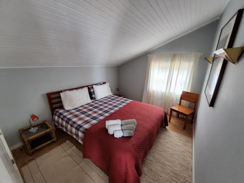 מיטה או מיטות בחדר ב-Casa Gaivina 1