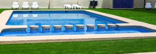 Kolam renang di atau dekat dengan Calmo Singular Apartments