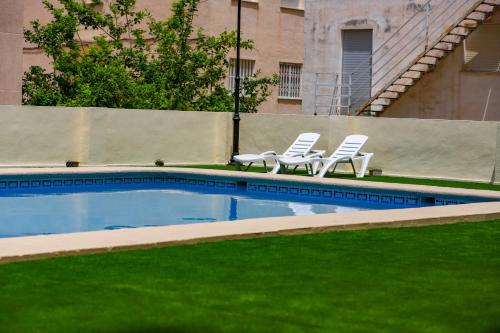 Kolam renang di atau dekat dengan Calmo Singular Apartments