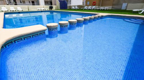Kolam renang di atau dekat dengan Calmo Singular Apartments