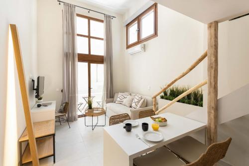Televízia a/alebo spoločenská miestnosť v ubytovaní Palm Residences
