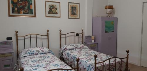Krevet ili kreveti u jedinici u okviru objekta CASCINA LAI - Oasi Naturalistica - Camere private