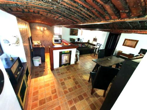 an aerial view of a living room with a fireplace at Casa din colțul Cetății in Hărman