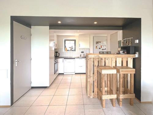 a kitchen with a counter top in a room at Le Vieux Sart 14 in Stavelot