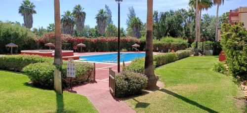 Bazén v ubytovaní Apartamento Ayamonte Isla Canela Golf alebo v jeho blízkosti