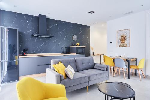 Χώρος καθιστικού στο 9 NIDOS Céntrica Suites - Nuevo