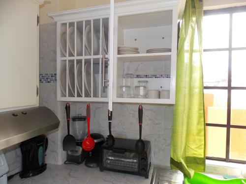 صورة لـ Stewart Apt- Trincity, Airport, Washer, Dryer, Office, Cable , WiFi في Trincity 