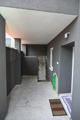 a hallway of a house with a ceiling at iLposto Down in Kavala