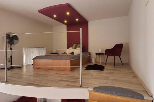 Posteľ alebo postele v izbe v ubytovaní Apartman Szeged szívében