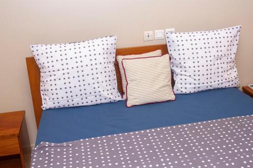 Ein Bett oder Betten in einem Zimmer der Unterkunft RESIDENCE rubis