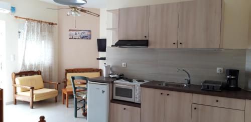 Kuchyň nebo kuchyňský kout v ubytování Crete Essence Villas - Makrygialos
