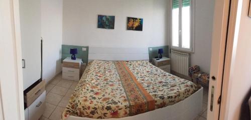 Ένα ή περισσότερα κρεβάτια σε δωμάτιο στο Giovanni in romantic Adria on the beach
