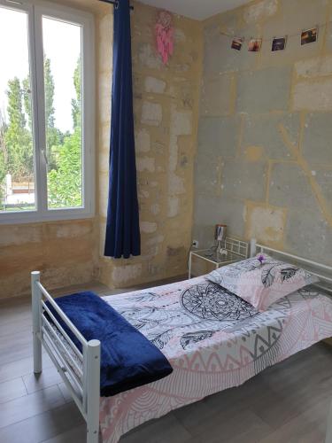 Ένα ή περισσότερα κρεβάτια σε δωμάτιο στο Mas provençal
