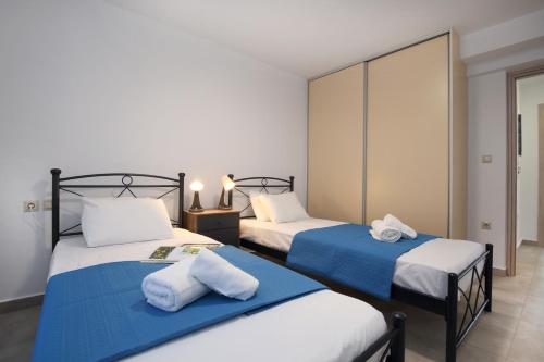 Postel nebo postele na pokoji v ubytování Ionian White - Apartment C