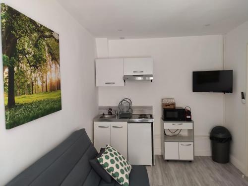Kuchyň nebo kuchyňský kout v ubytování DG LOCATION