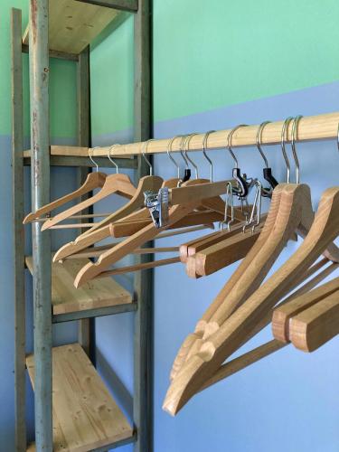 a group of wooden hangers on a shelf at Don Ciccio Capashome in Ceglie Messapica