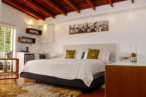 Llit o llits en una habitació de Una casa con vistas en Caracas
