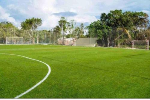 an empty soccer field with a goal at Espectacular Apartamento En Tanama Cap Cana in Punta Cana