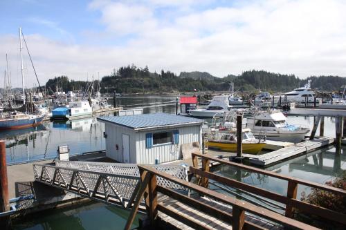 a marina with boats docked in a harbor at Quarterdeck Inn Port Hardy in Port Hardy