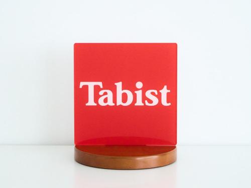 a red box with the word tadaust on it at Tabist Gloire Osaka in Osaka