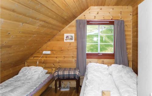 מיטה או מיטות בחדר ב-Gorgeous Home In kra With Wifi