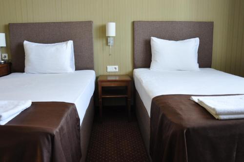 Hotel 7yaにあるベッド