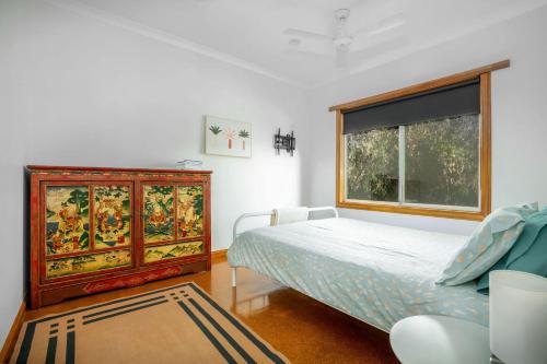 Postel nebo postele na pokoji v ubytování Cozy Beach Hideaway Pet friendly