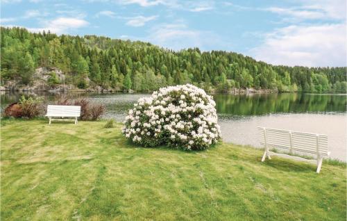 A garden outside Three-Bedroom Holiday Home in Ulefoss