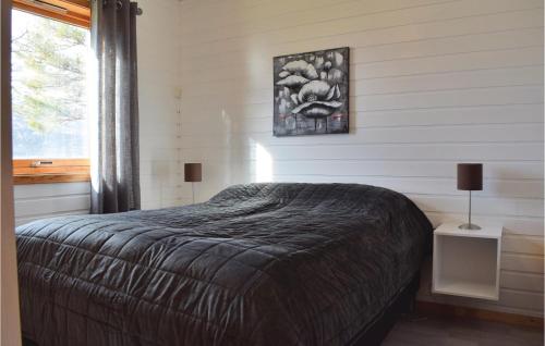 Кровать или кровати в номере 3 Bedroom Stunning Home In Hol I Tjeldsund