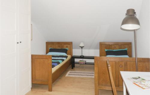 Ένα ή περισσότερα κρεβάτια σε δωμάτιο στο Nice Apartment In Schieder-Schwalenberg