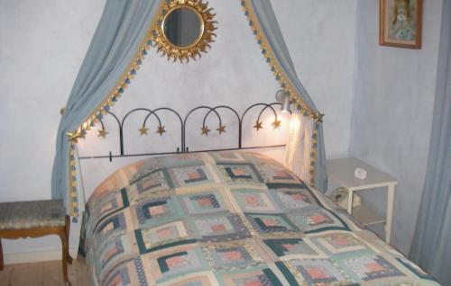 a bedroom with a bed with a canopy and a mirror at 3 Bedroom Beautiful Home In Trosa in Trosa