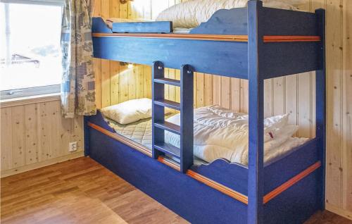 a couple of bunk beds in a room at Skarsnuten in Hemsedal