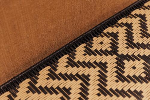 a close up of a blanket with a pattern on it at Sui Boutique Hotel in Medellín