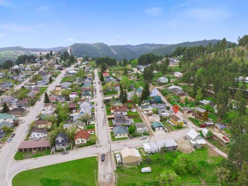an aerial view of a small town with houses at The Overlook Nook in Lead