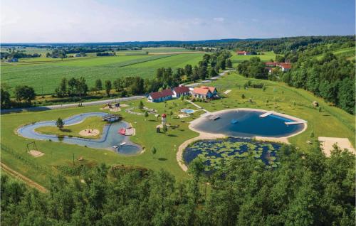 an aerial view of a park with a large swimming pool at Ferienhaus In Heiligenbrunn in Heiligenbrunn