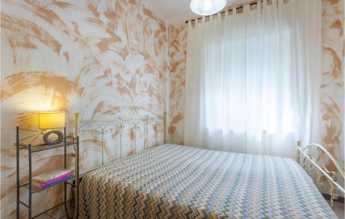 Un ou plusieurs lits dans un hébergement de l'établissement Lovely Apartment In Carovigno With Kitchen