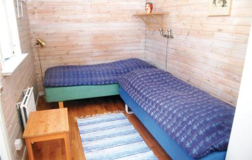 Кровать или кровати в номере Villa Skogshem