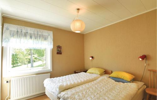 Ein Bett oder Betten in einem Zimmer der Unterkunft 2 Bedroom Nice Home In Bengtsfors