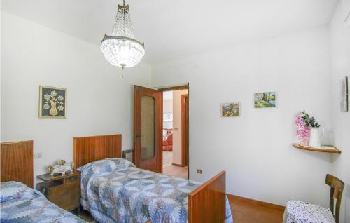 Postel nebo postele na pokoji v ubytování Beautiful Apartment In Magliano