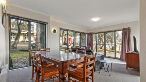 a dining room with a table and chairs at Karoondah 10 in Mount Hotham